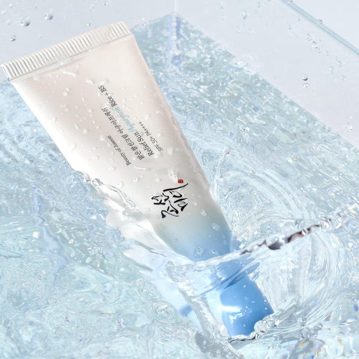 Beauty of Joseon Relief Sun Aqua-fresh : Rice + B5 SPF50+ PA++++ sunscreen tube splashing in clear water