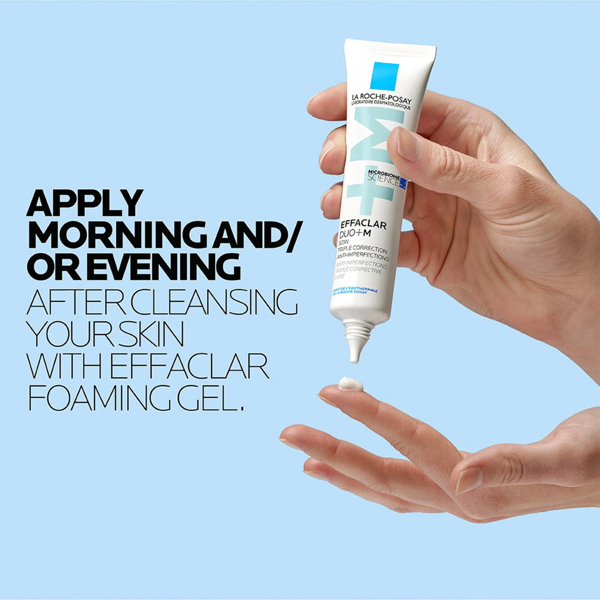 Hand squeezing La Roche-Posay Effaclar Duo+M Triple Corrective Care cream onto fingertips, with text to apply morning and/or evening after cleansing