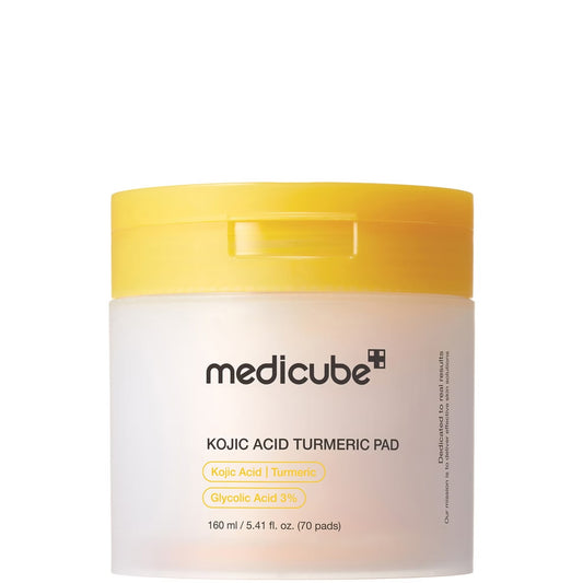 Closed medicube Kojic Acid Turmeric Pad jar with a yellow lid on a white background, showing the product name and 160 ml (70 pads) size.